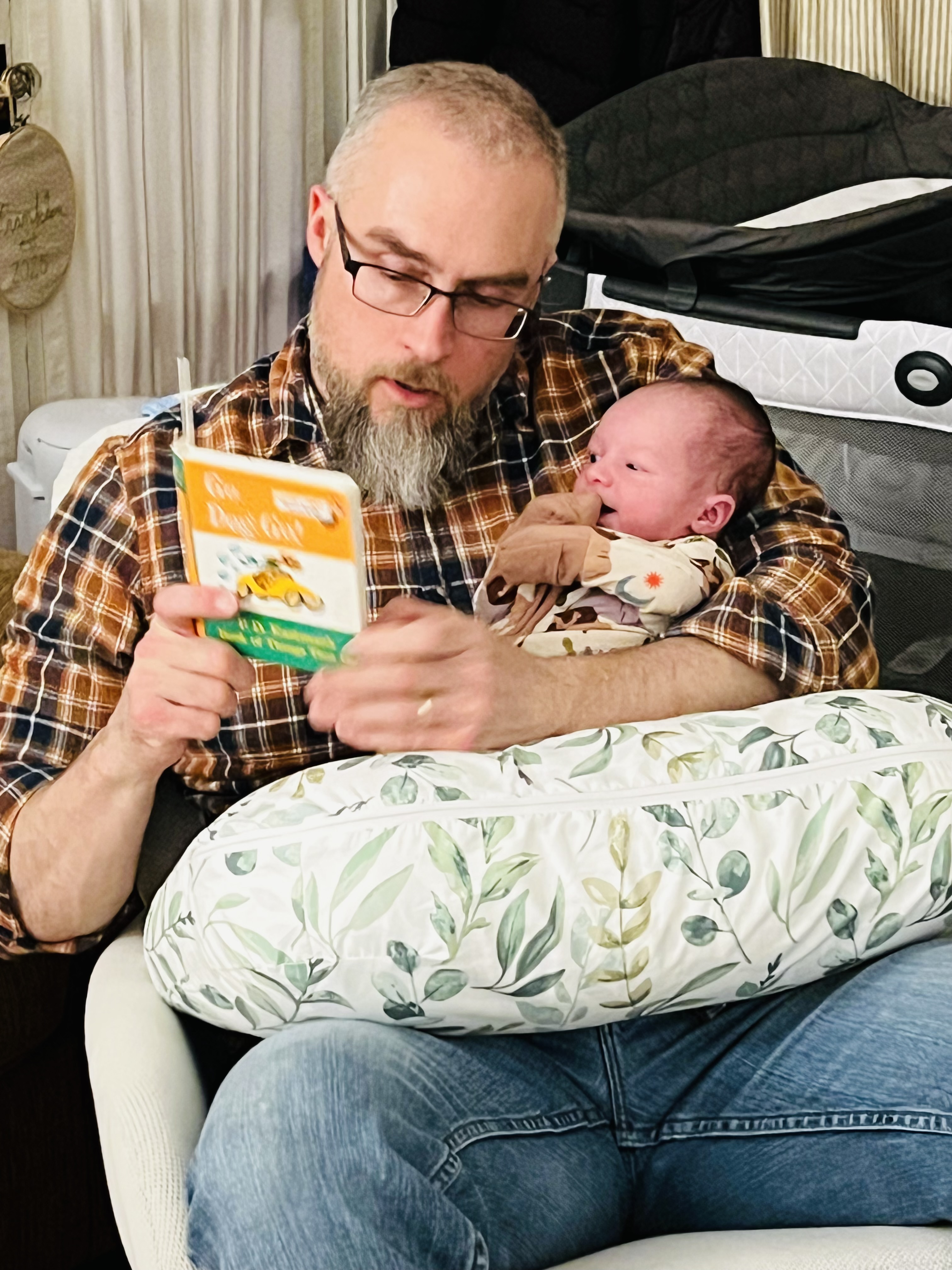 Eric reading to his grandson